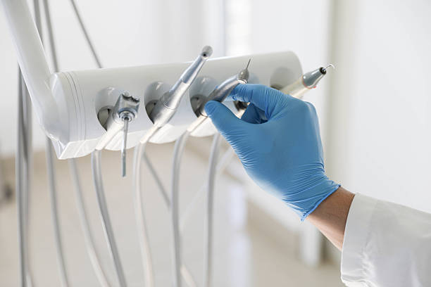 Professional Tooth Extraction technician working in Mountrail County County, ND